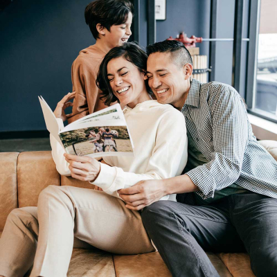A happy couple reading the valentine's softcover photo book